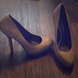 Size 38. Light wear, excellent condition.